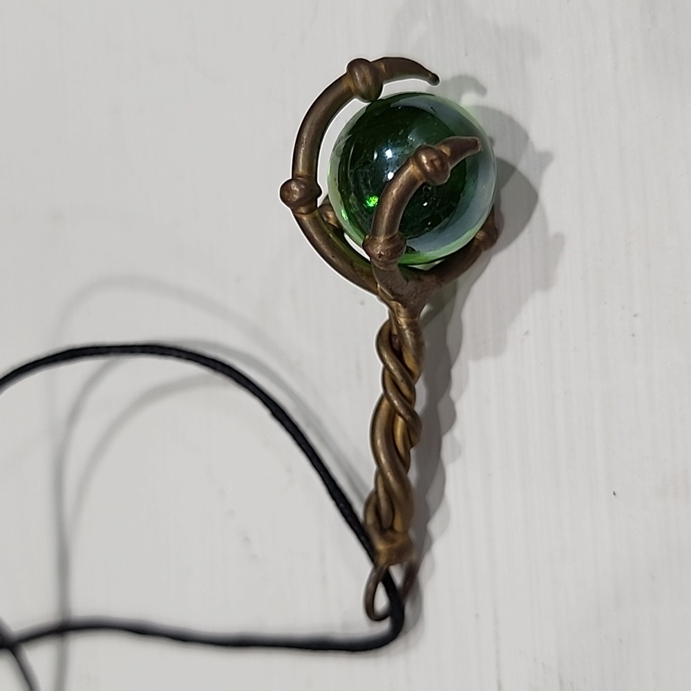 Metal creepy hand necklace,  creepy hand holding a crystal ball